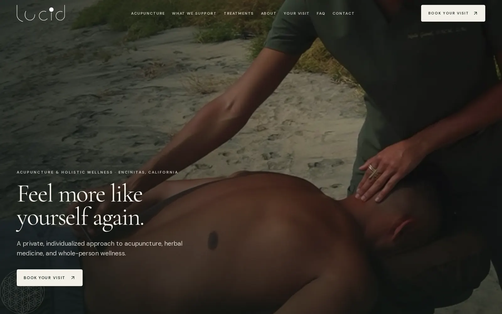 Lucid's homepage: a full-width photograph of a treatment on the beach, the headline Feel more like yourself again, and a Book your visit button.